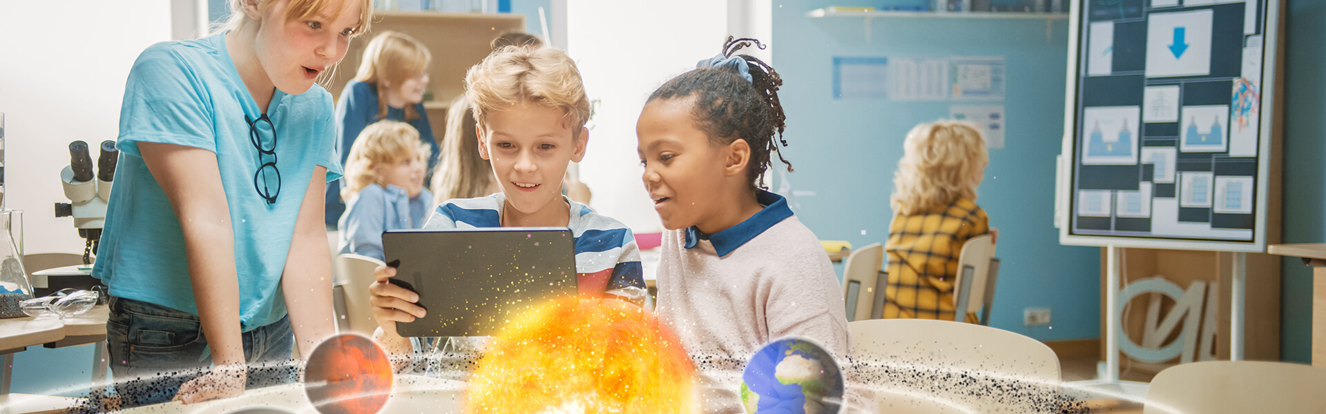 children looking at the laptop