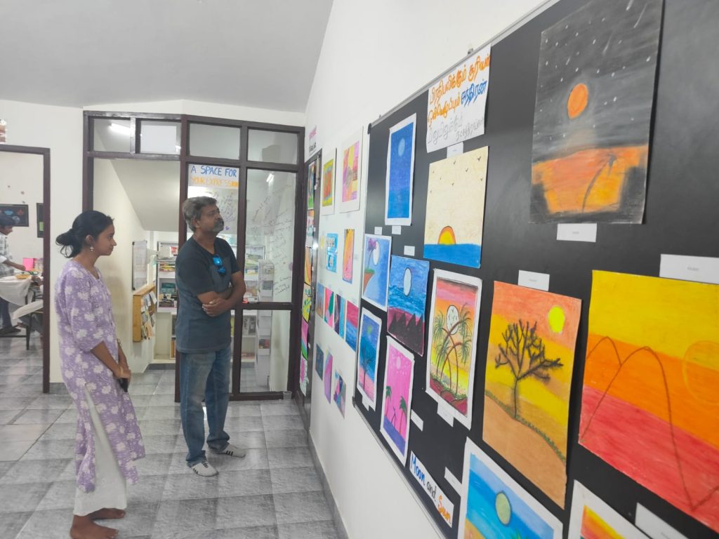 man and girl admiring the art